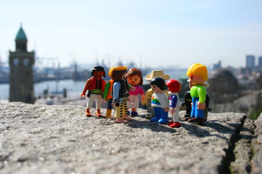 Hamburg: Guided Port Walk for Families - Deichstraße waterfront walking: merchants, pirates, and houses near the water