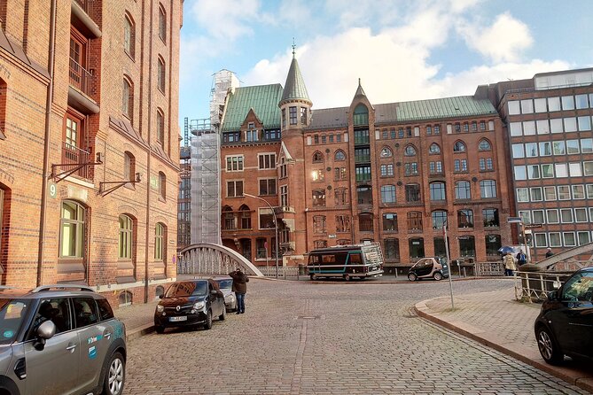 Historic Free Tour of Hamburg Old Warehouse District - Chilehaus: the ship-bow facade and the people behind the port