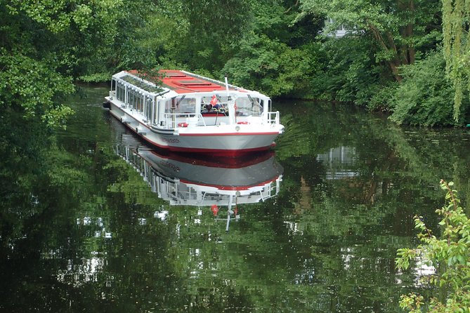 Kanalfahrt - Discover the different faces of the city! - The contrast stretch: villas, hidden parks, and upscale suburb life from the water